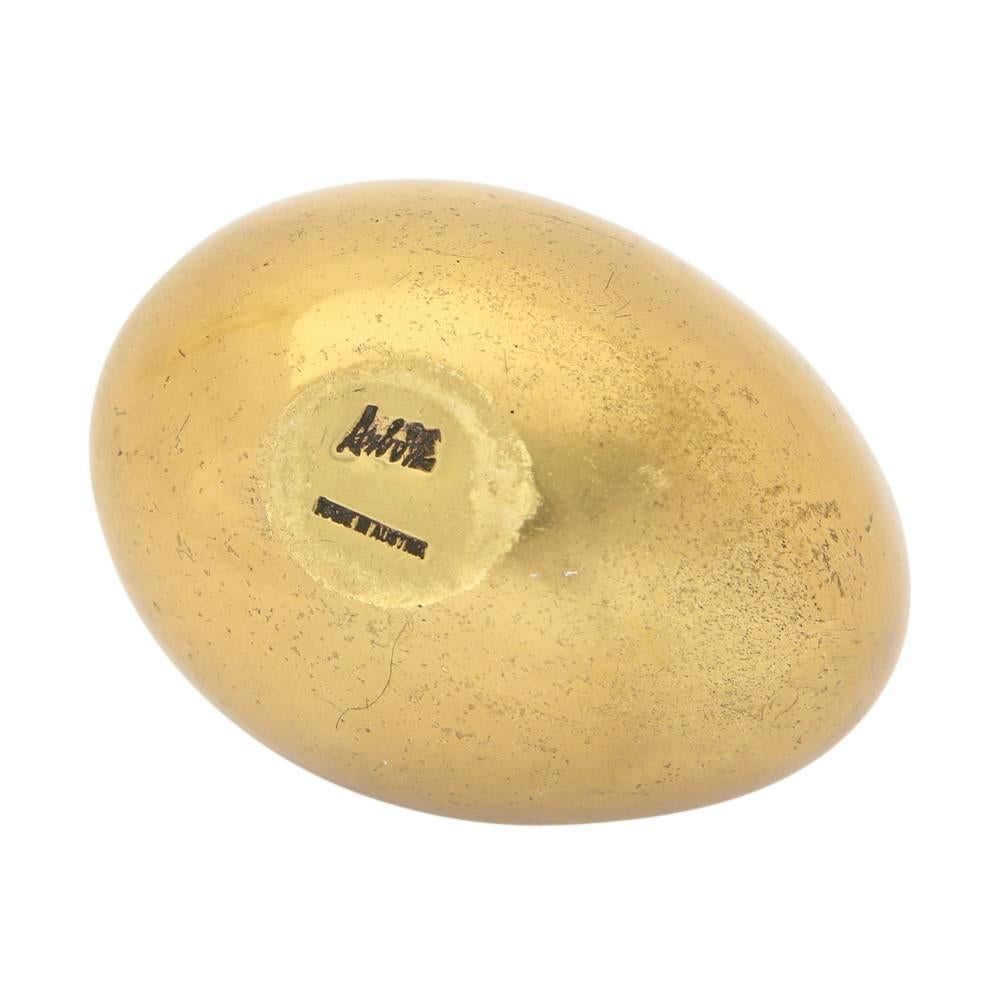 Carl Aubock brass egg paperweight, signed, Austria, 1950s. Polished cast brass paperweight by the Austrian master.