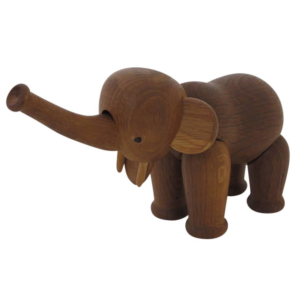 Kay Bojesen oak elephant signed, Denmark, 1960s. Complete with moveable parts. Very good original condition. With trunk extended, elephant is 9 inches. Signed on two of the feet: Kay Bojesen, Denmark. 


