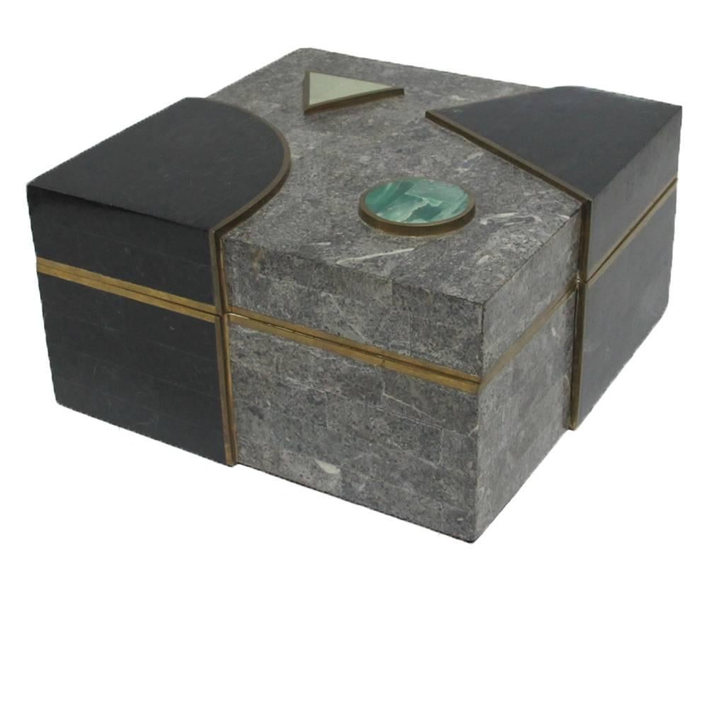 Stone and brass box geometric Postmodern, USA, 1980s. Large lidded box with 1980s Postmodern top. Black and grey with brass edging and two inlaid stones.
