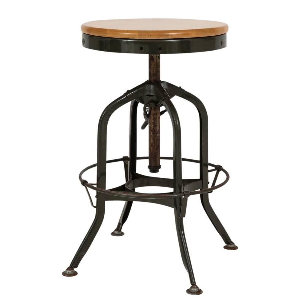 Toledo stool, adjustable swivel, wood and painted steel, signed. The Classic Toledo stool with a round adjustable seat that extends to 30 inches. The frame retains its original 