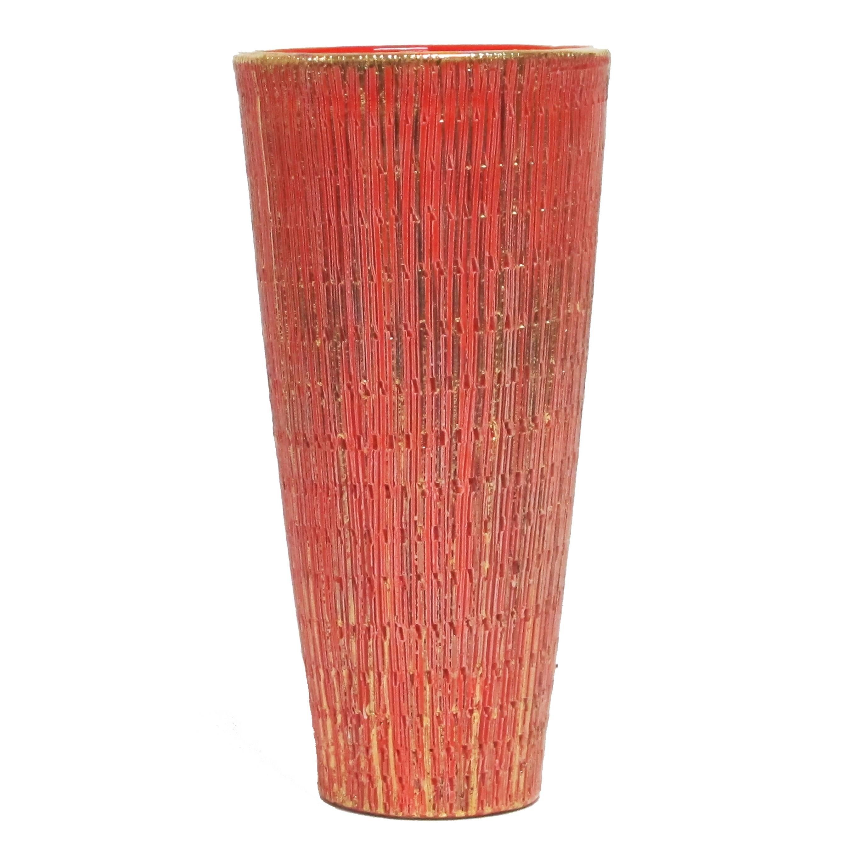 Bitossi Seta vase, ceramic orange and gold, signed. Small scale tapered vase from Aldo Londi's Seta (Silk) series. The rim is glazed with a gold band and the body is decorated with an intricate pattern of textured orange and gold vertical stripes.