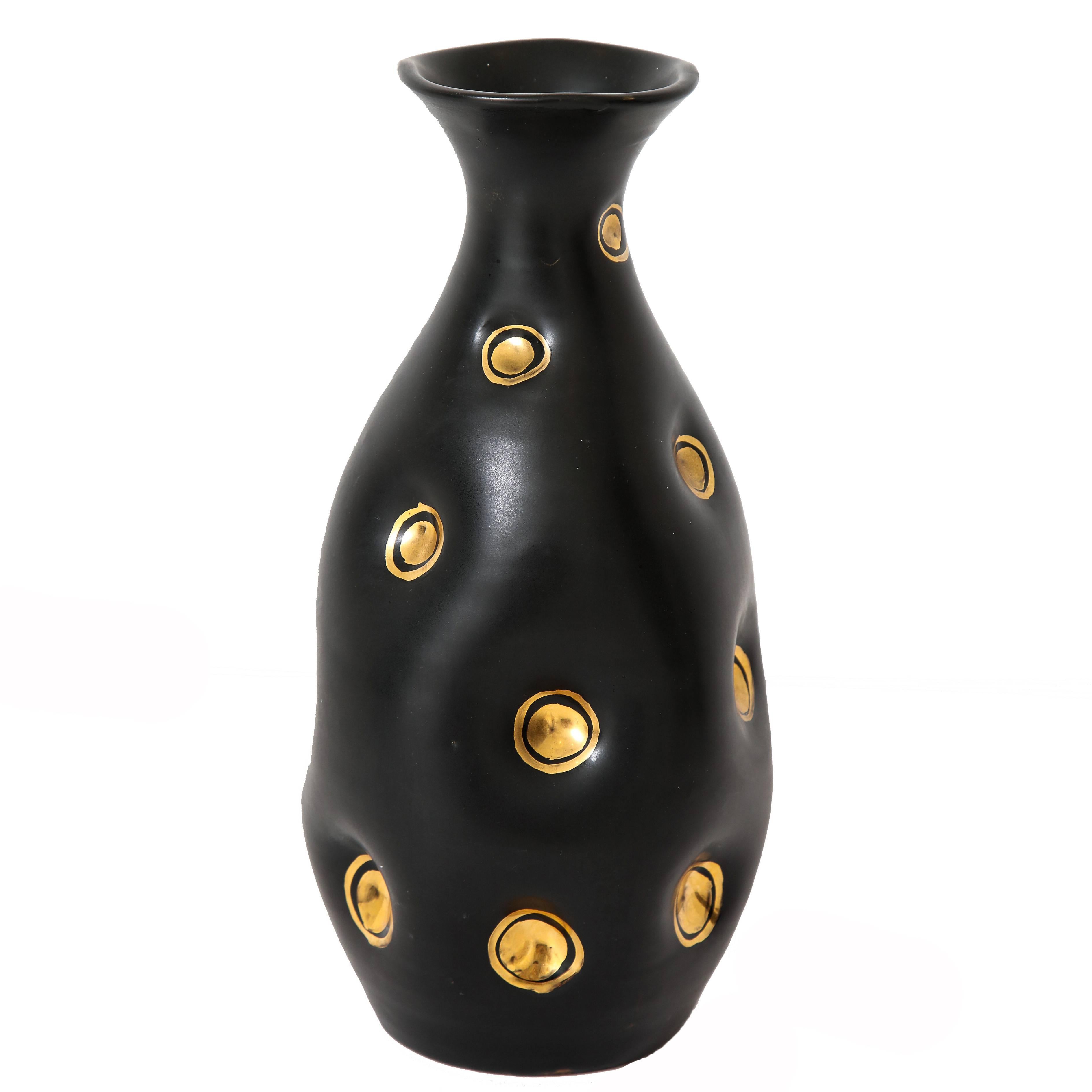 black and gold pottery