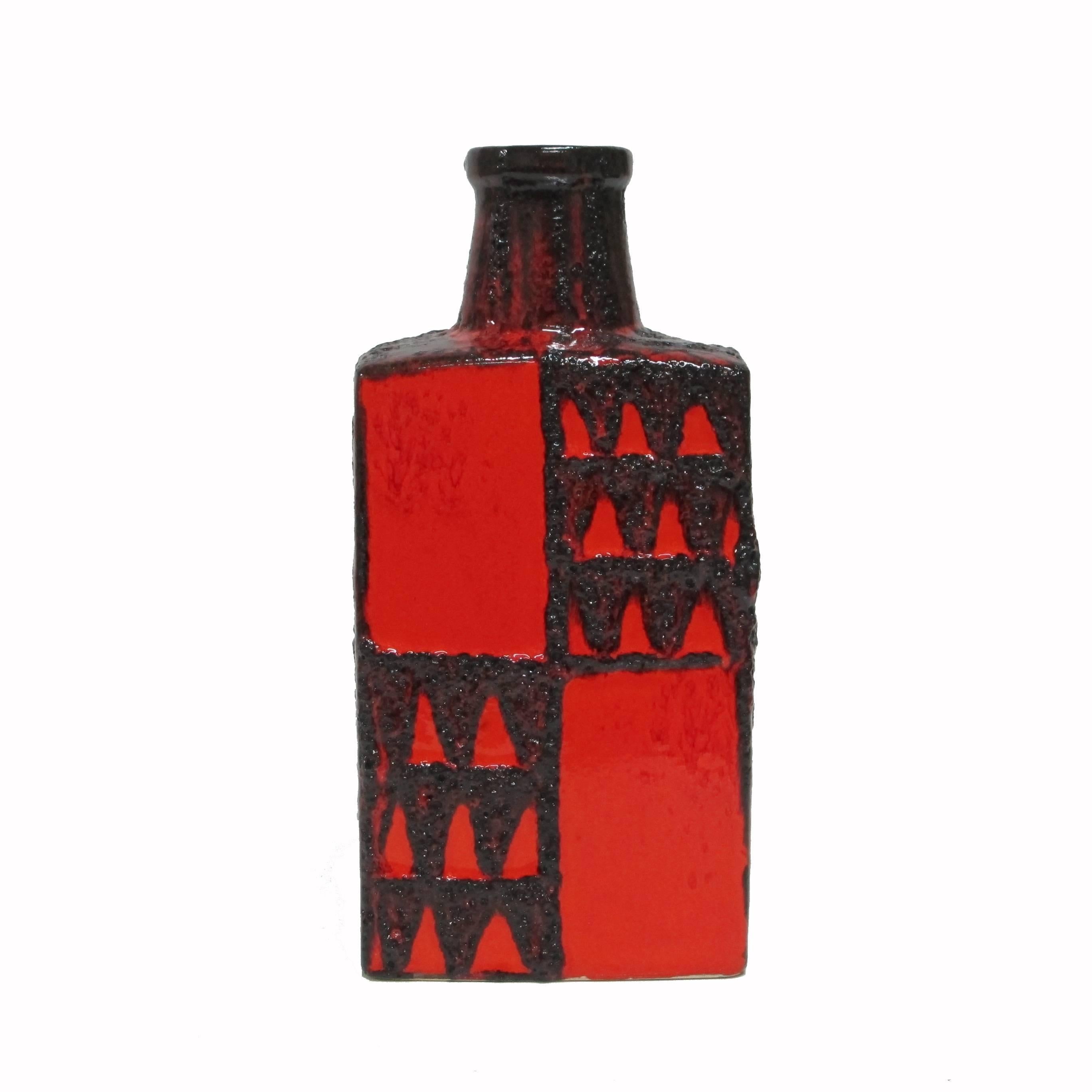 Scheurich Keramic Vase, Lava Glaze, Ceramic, Red and Black, Geometric, Signed. Medium scale bottle shaped vase with drip lava glaze.  Signed on underside: 281-30 W. Germany.


 