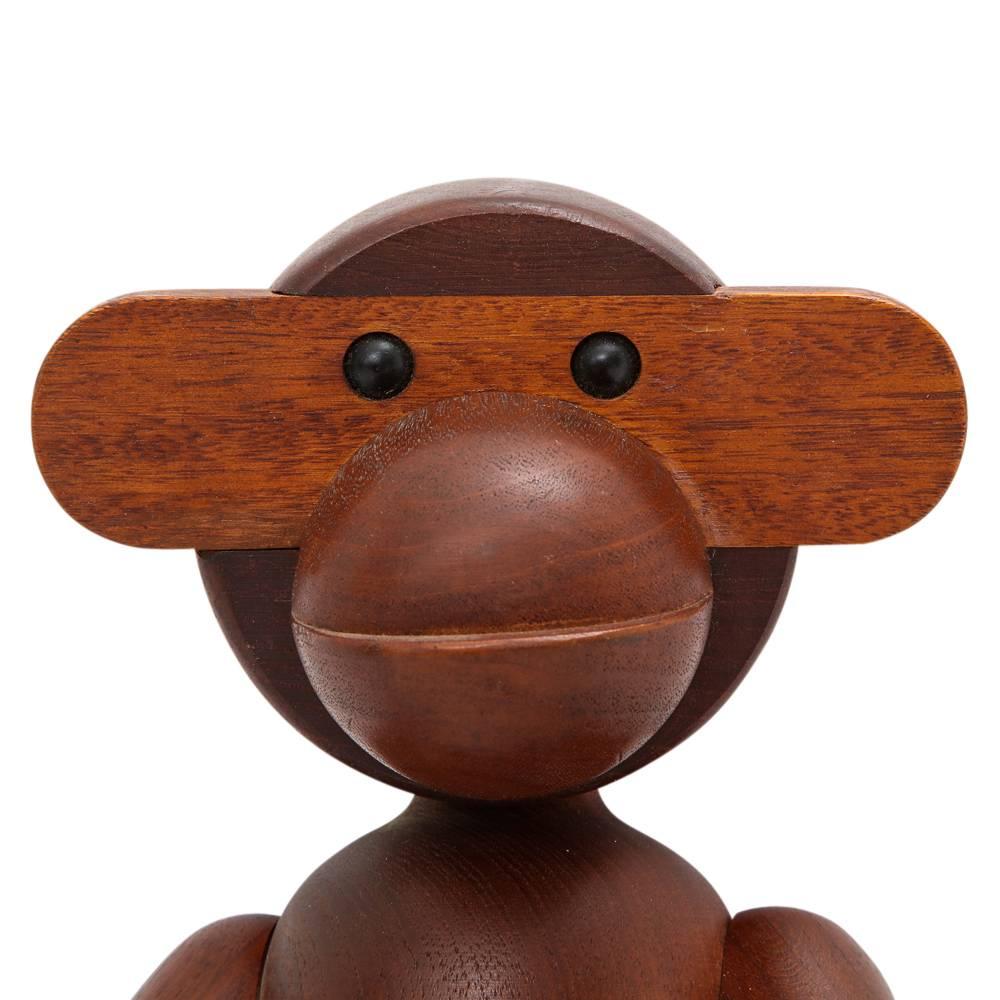Kay Bojesen monkey teak signed. Medium to large scale toy monkey in teak and limba wood with articulated joints, movable head, arms and legs. Impressed brand on inside of right hand: Kay Bojesen Denmark.