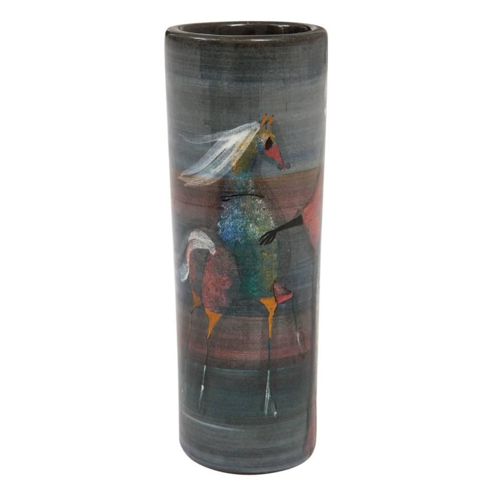 Polia Pillin vase, ceramic, green, red and pink, signed. Small cylinder vase with dream-like decoration of a woman and horses glazed in green, red, blue/gray, with splashes of pink and orange. Signed Pillin on the underside of the vase. 

Pillin,