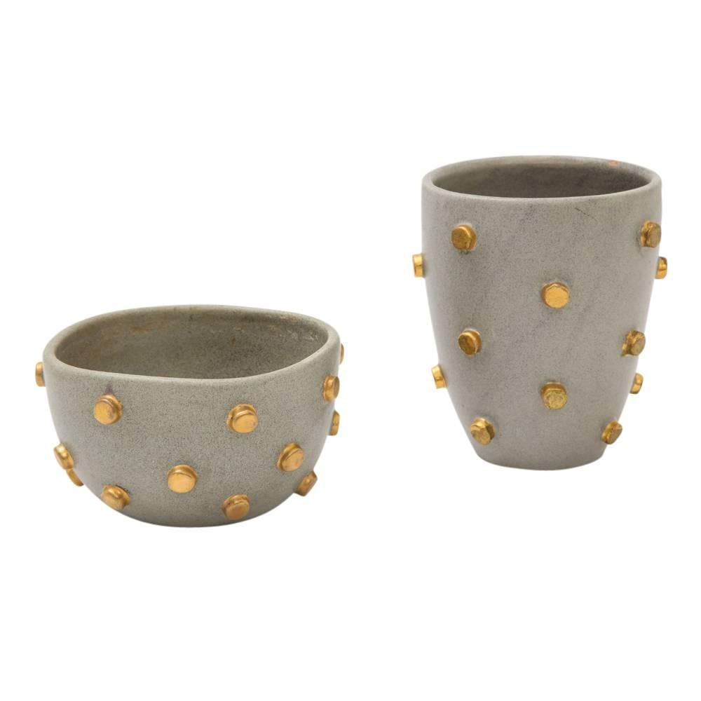Set of Bitossi ceramics bowl vase gray gold Hobnails signed Italy, 1960s. Vase is marked V321/15 Italy. Bowl is marked 95/290 C Italy. Vase measures: 6 inches H x 4.75 W and the bowl measures 3.5 inches high x 5.5 wide.