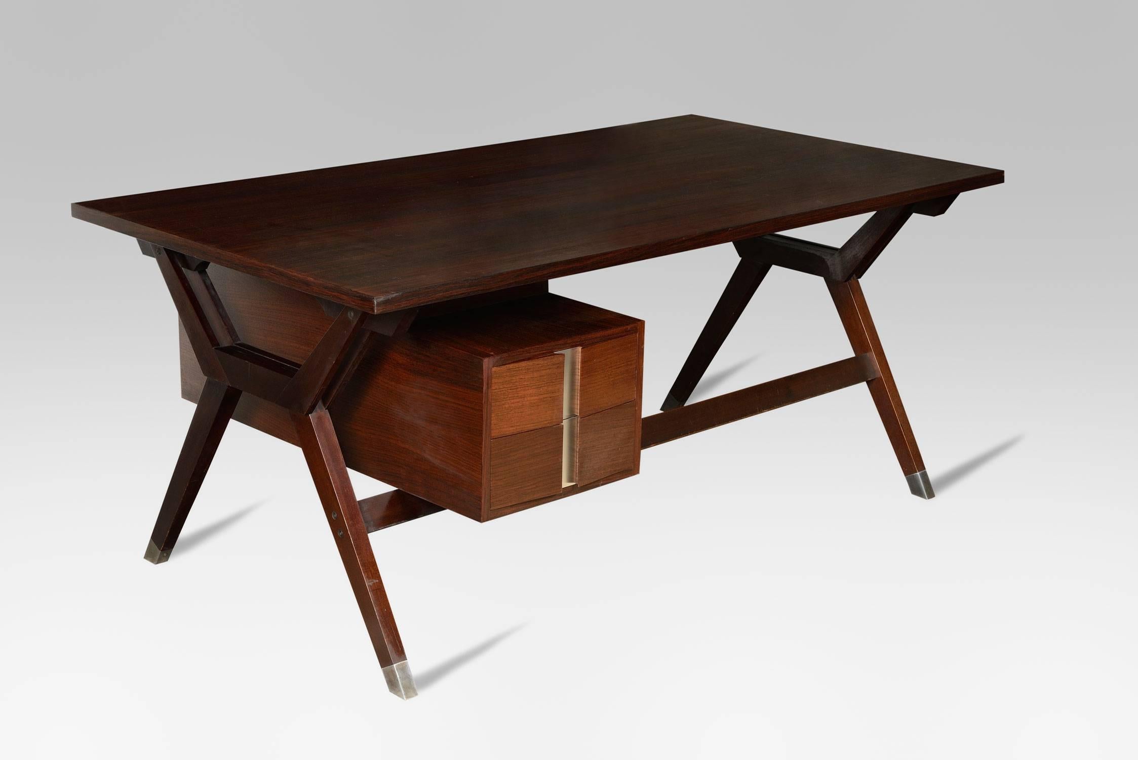 Large flat desk by Ico Parisi (1916-1996)
1958, Italy
For MIM Roma (label)
Rosewood
Flat desk on X-base with chrome legs
Two-sided drawer storage unit
Shelf
Measures: 74 x 180 x 90 cm
In good conditions.