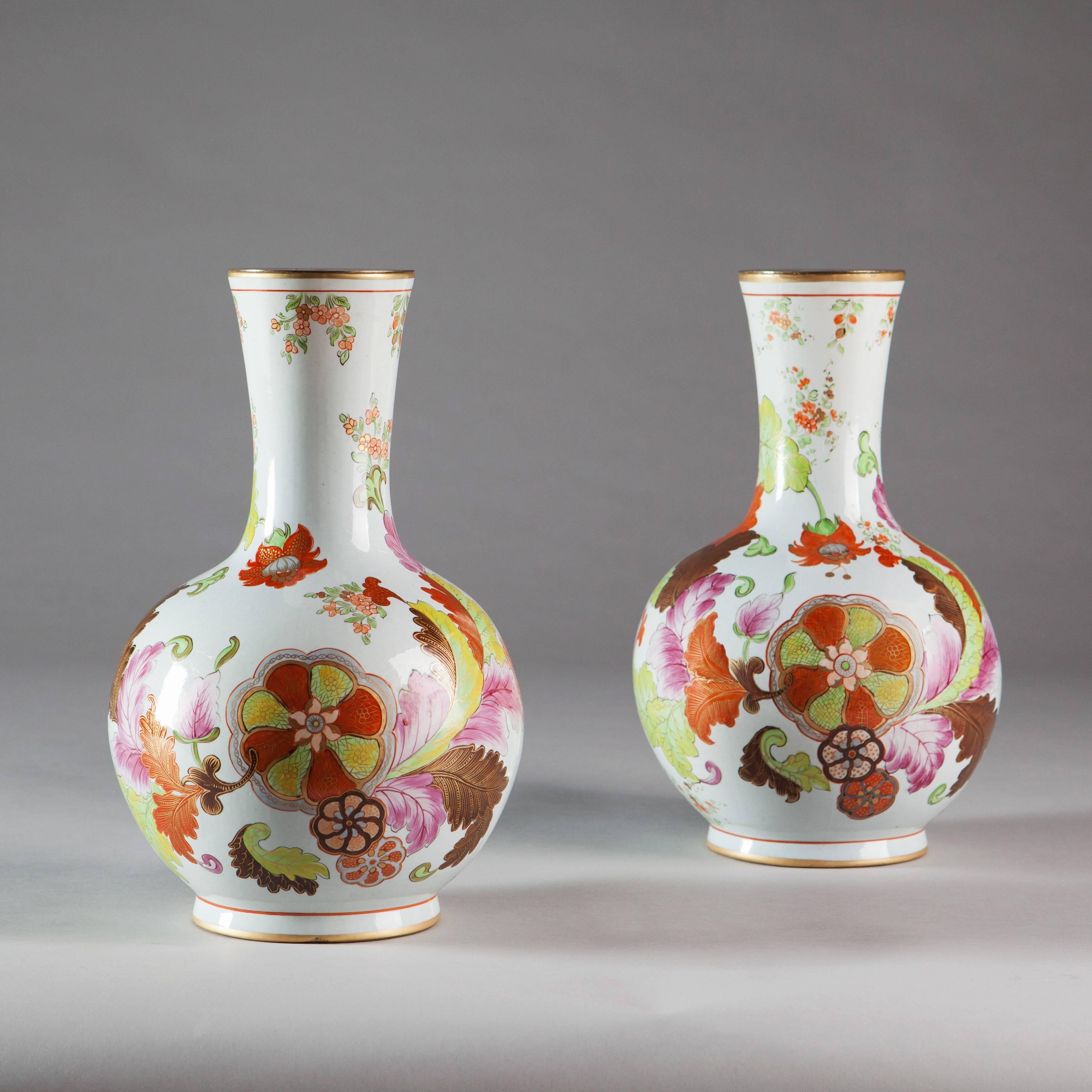 A fine pair of mid-19th century Italian tobacco leaf pattern vases.