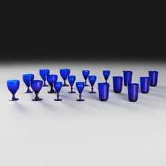 A Set of 18 Bristol Blue Wine Glasses and Tumblers