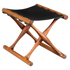 A Mid 20th Century Danish Wood and Leather Folding Stool by Poul Hundevad
