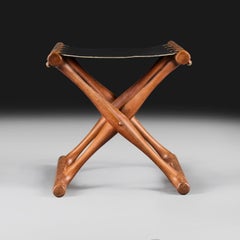 A Mid 20th Century Danish Wood and Leather Folding Stool by Poul Hundevad