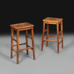 A Matched Pair of Early 20th Century Oak High Stools