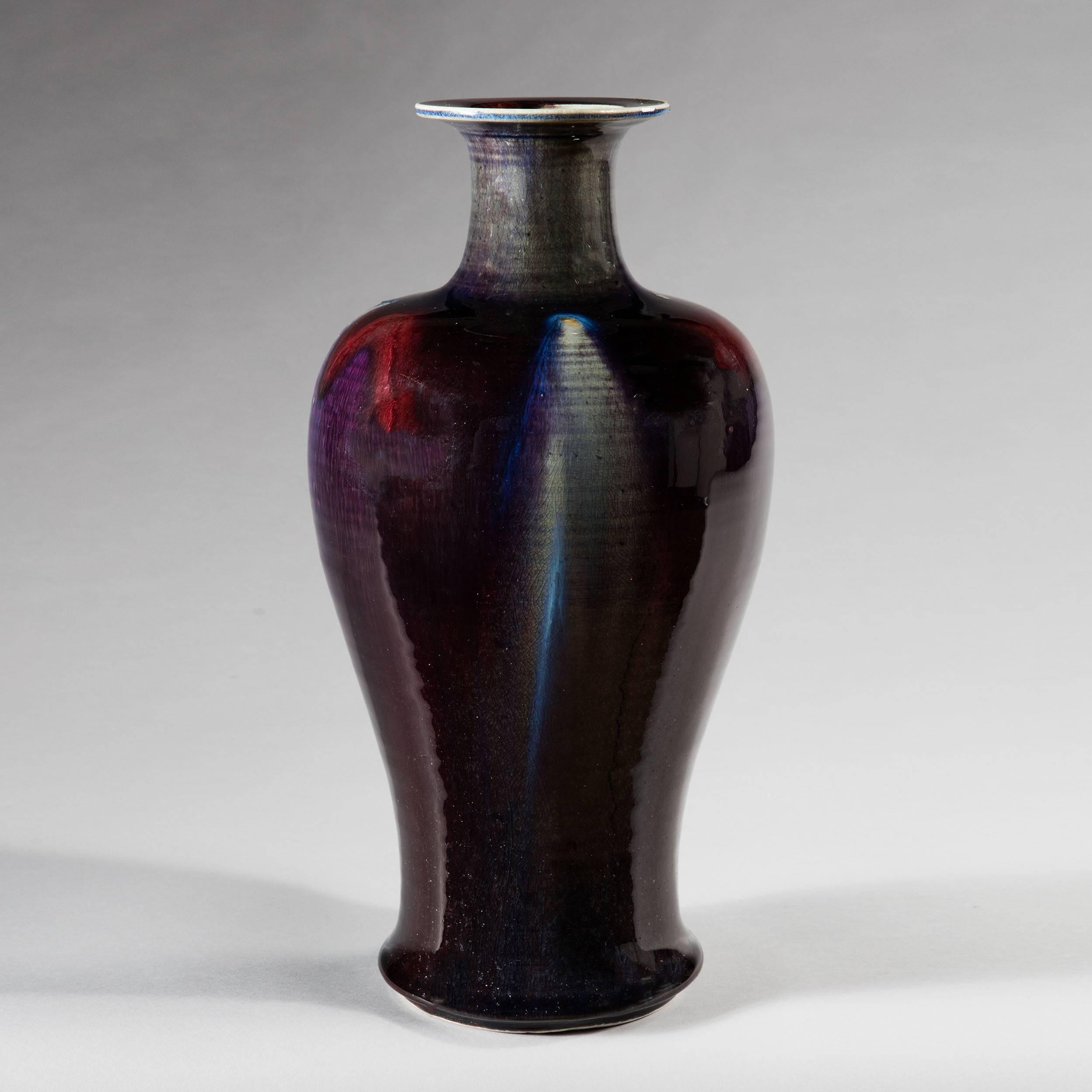 A fine 20th century flambé́ baluster vase of large-scale, with red, blue and grey coloration.