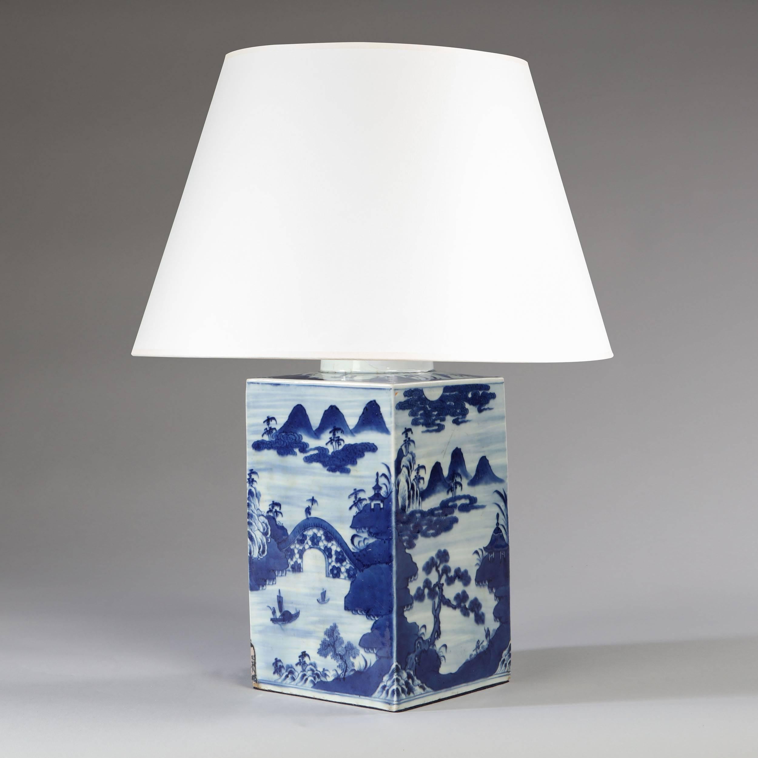 A fine early 19th century blue and white square tea jar, decorated with landscapes and mountainous scenes.