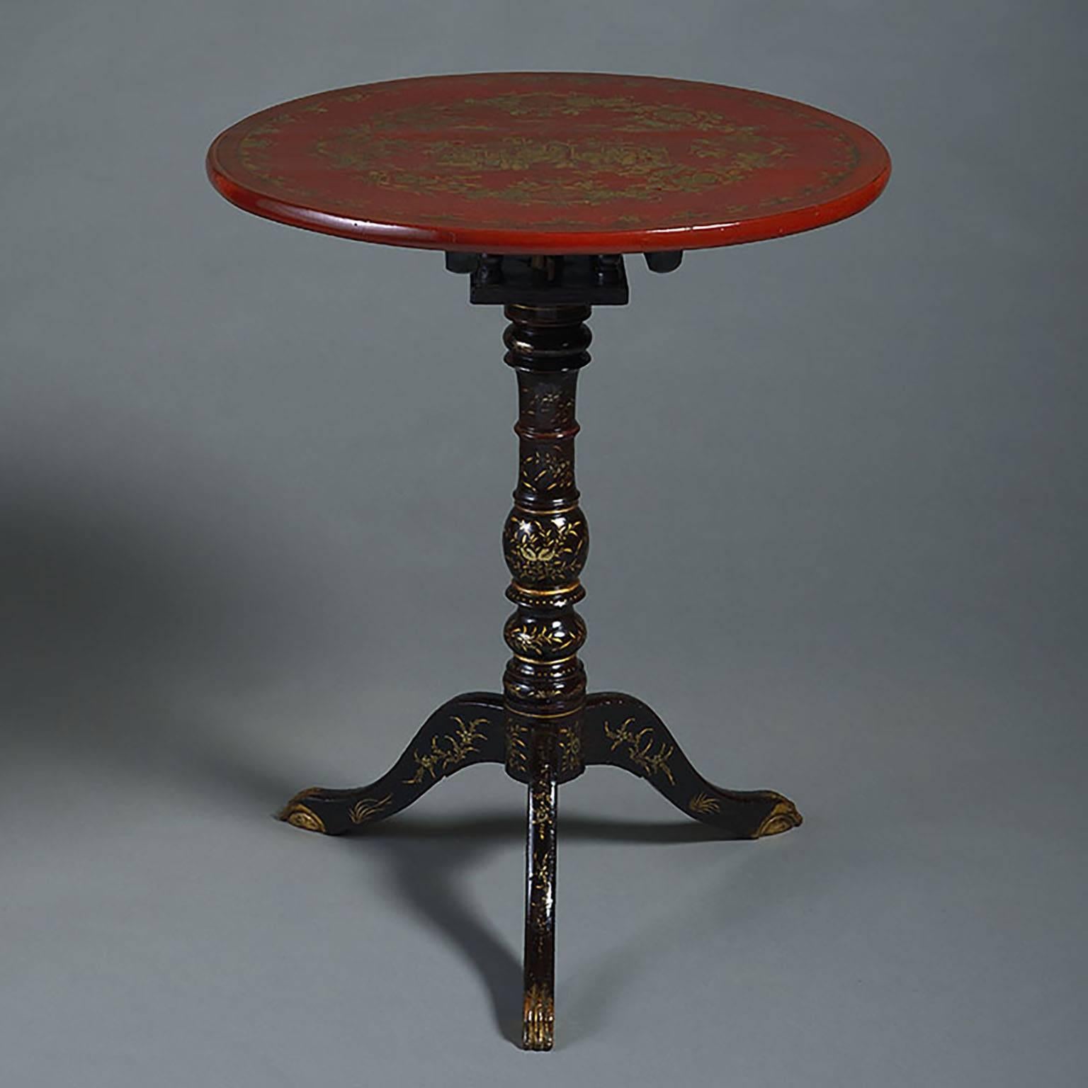 A fine mid-19th century Canton lacquer tilt top occasional table, the top decorated with pavilions and figures and foliate decoration, supported on a black lacquer pedestal tripod base.