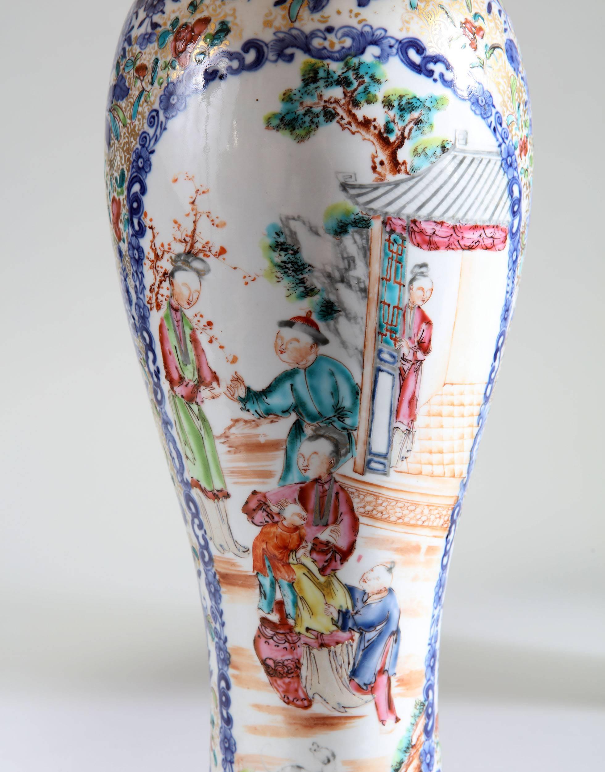 A fine pair of late 18th century Chinese export porcelain vases, now mounted as lamps, with polychrome decoration throughout, showing scenes of Chinese figures surrounded by a floral motif.

Please note: lampshades not included. 

Curently wired for