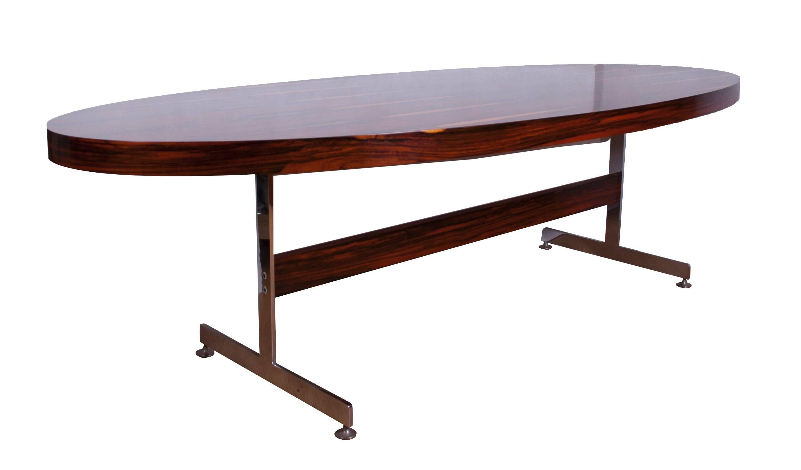 Merrow Associates rosewood and chrome conference table designed by Richard Young.
A very rare item from Merrow Associates, stunning Brazilian Rosewood on high quality flat chrome frame.
A truly smart conference table.
Dimensions: 74 cm H 259 cm W