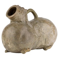 A Rare Yue Celadon-Glazed Figural Vessel, Western Jin dynasty (265-420)