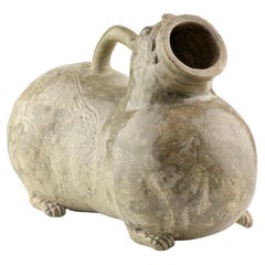 A Rare Yue Celadon-Glazed Figural Vessel, Western Jin dynasty (265-420)