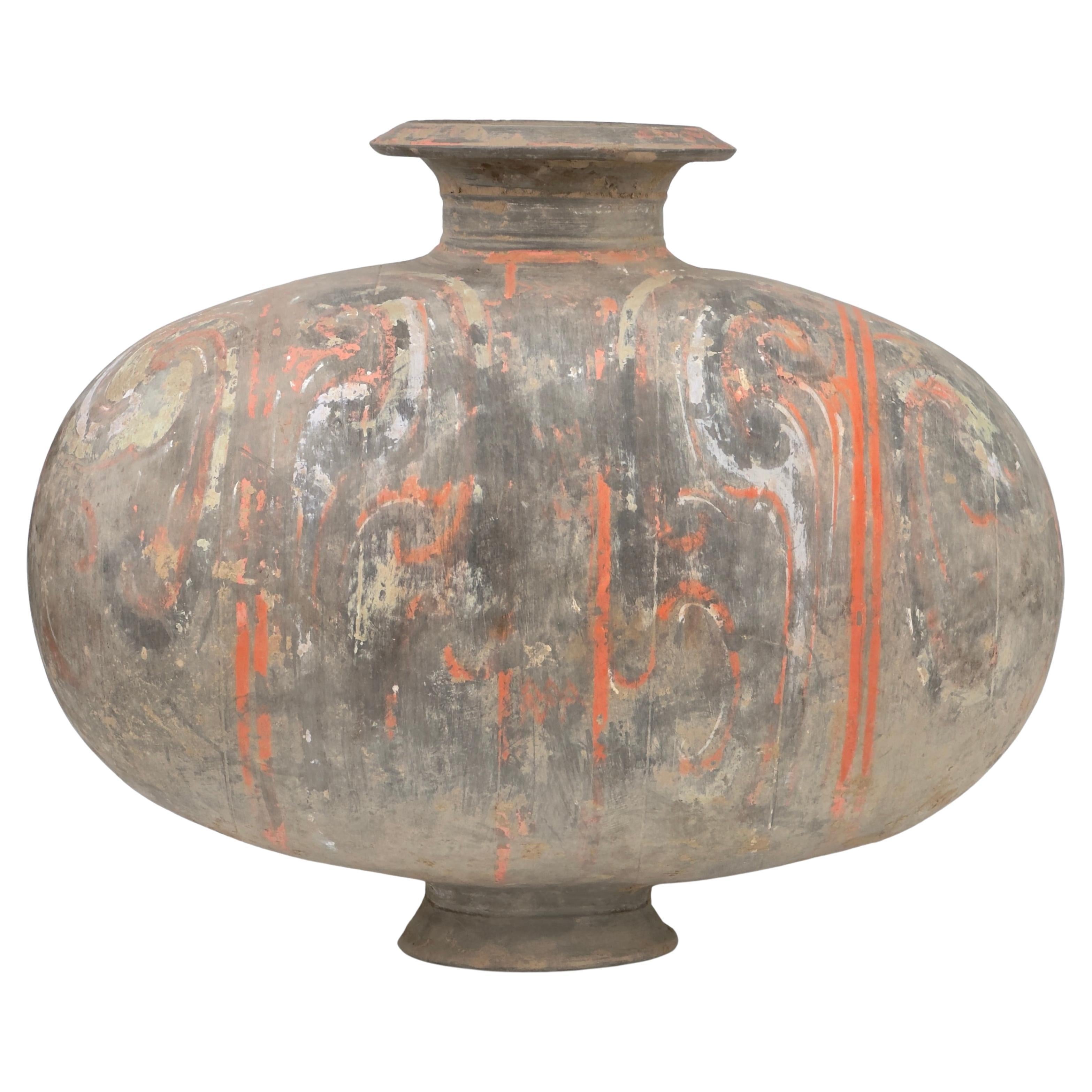 Large Cocoon-shaped jar with cloud-scroll design, Han Dynasty