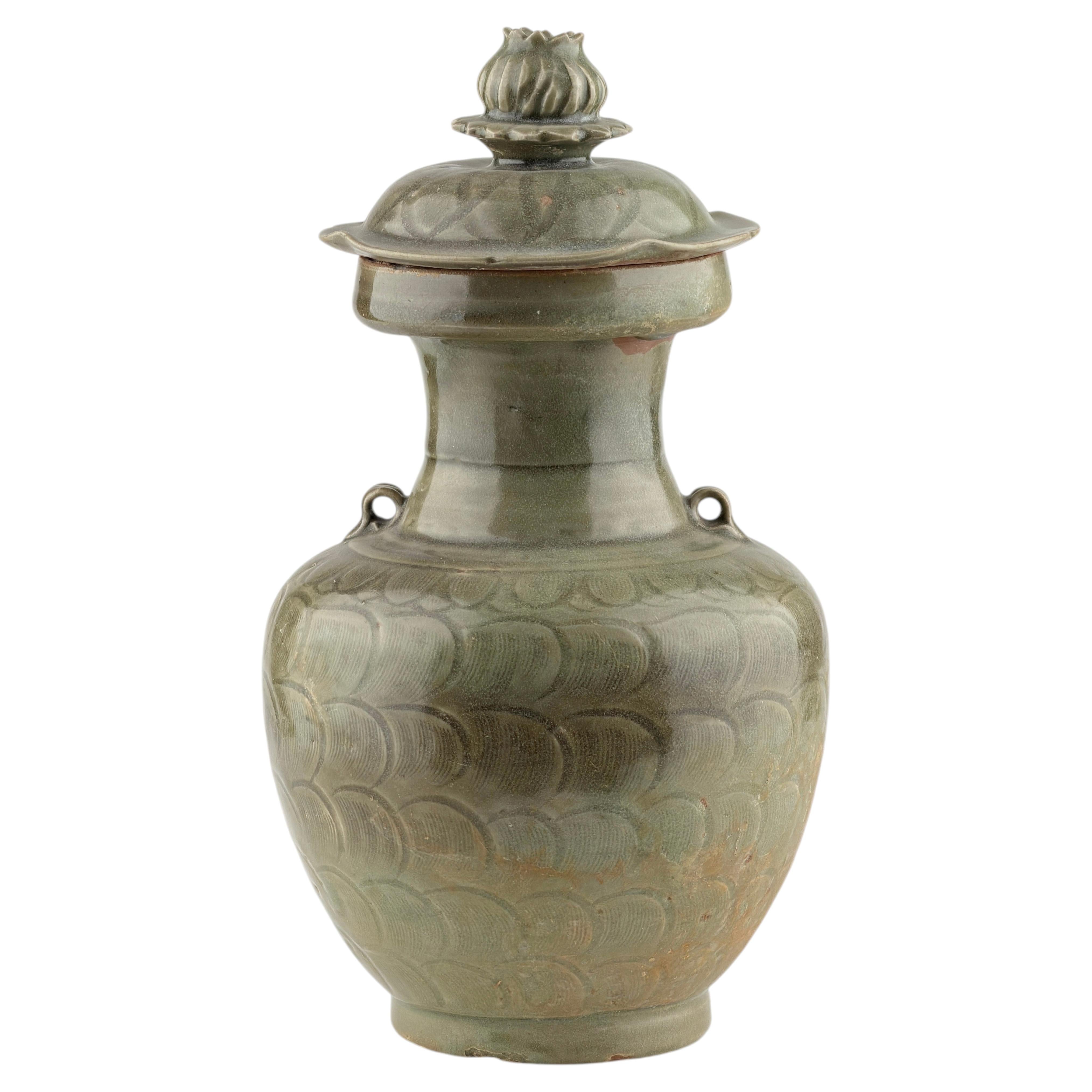 A Celadon jar with carved lotus petal design, Song Dynasty For Sale