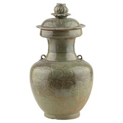 A Celadon jar with carved lotus petal design, Song Dynasty