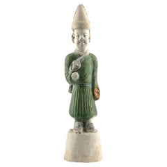 A Green Glazed Figure of Attendant, Ming Dynasty