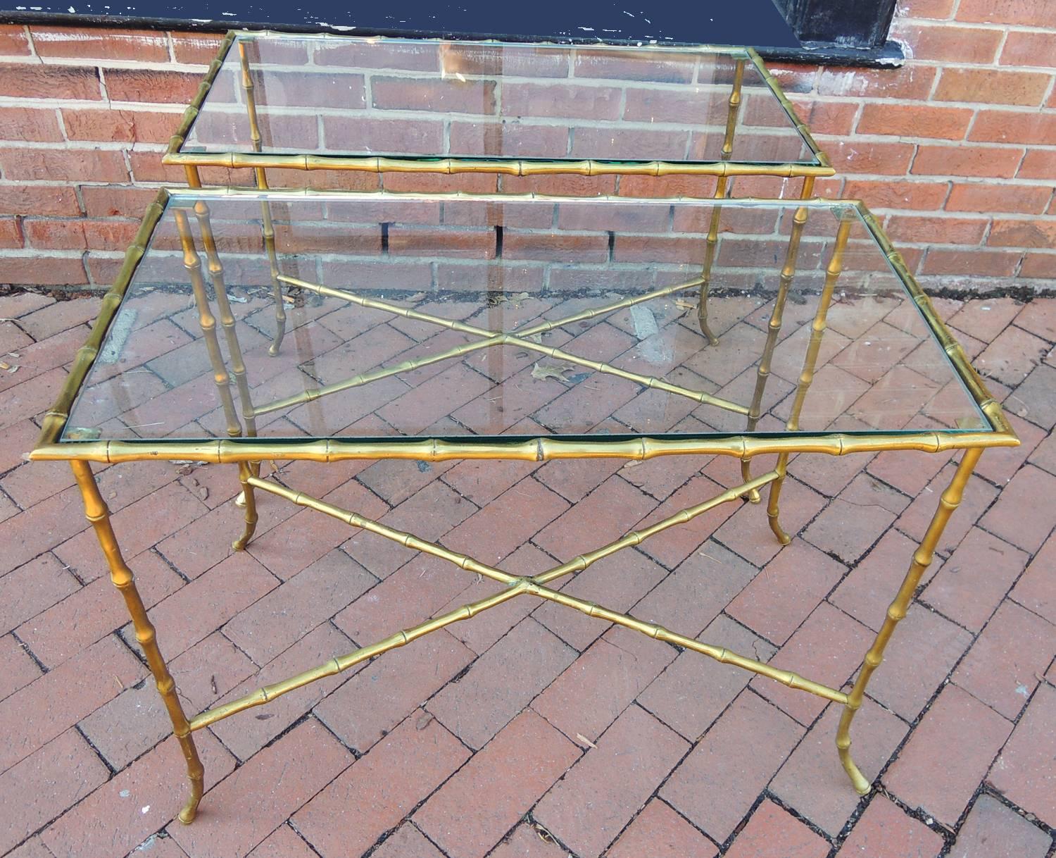 Well made, solid brass side tables, possibly by Baguès, certainly of their quality.