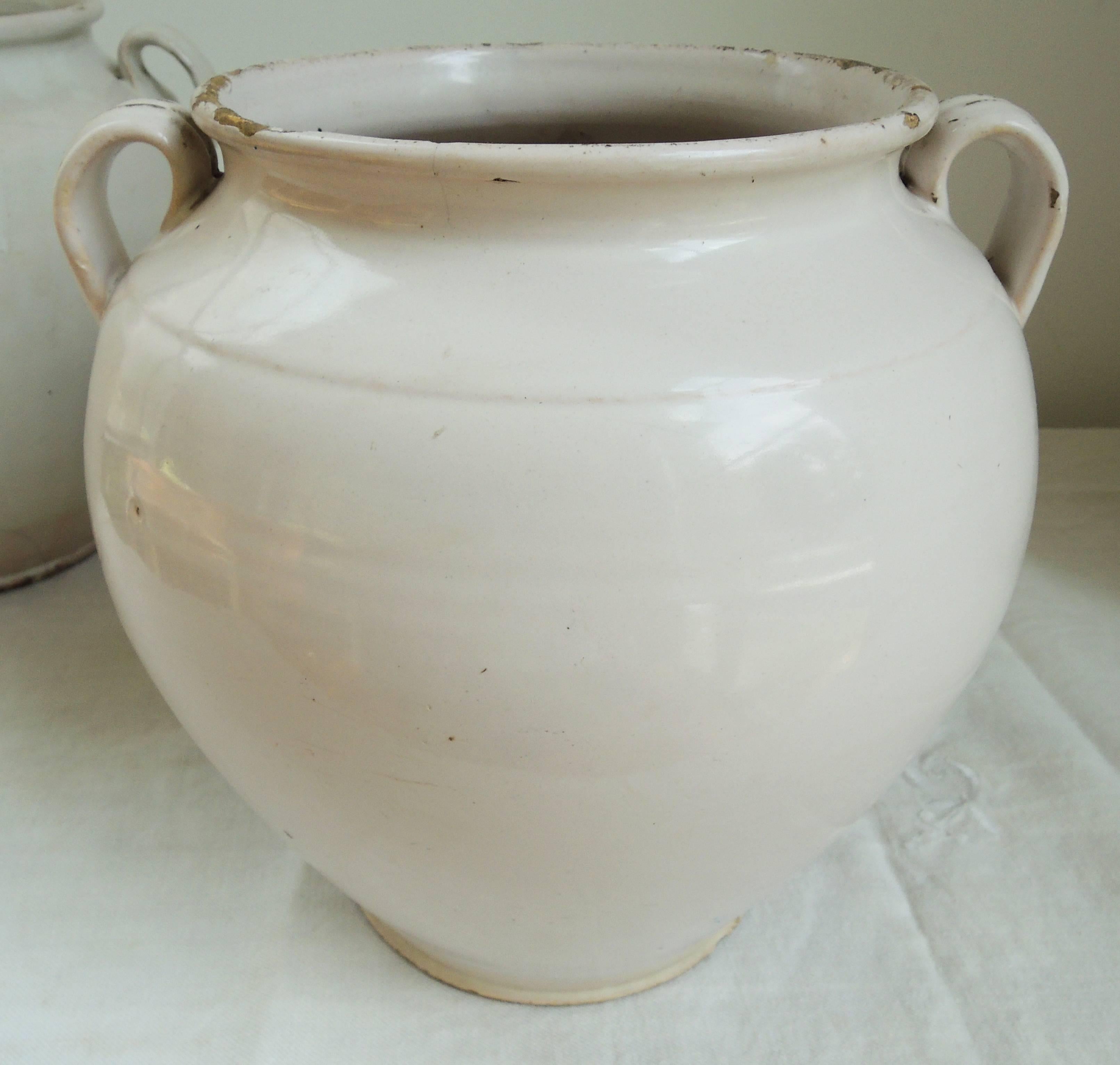 Late 19th century white glazed ceramic kitchen storage jars.
Two which are a very near match.
Priced individually.