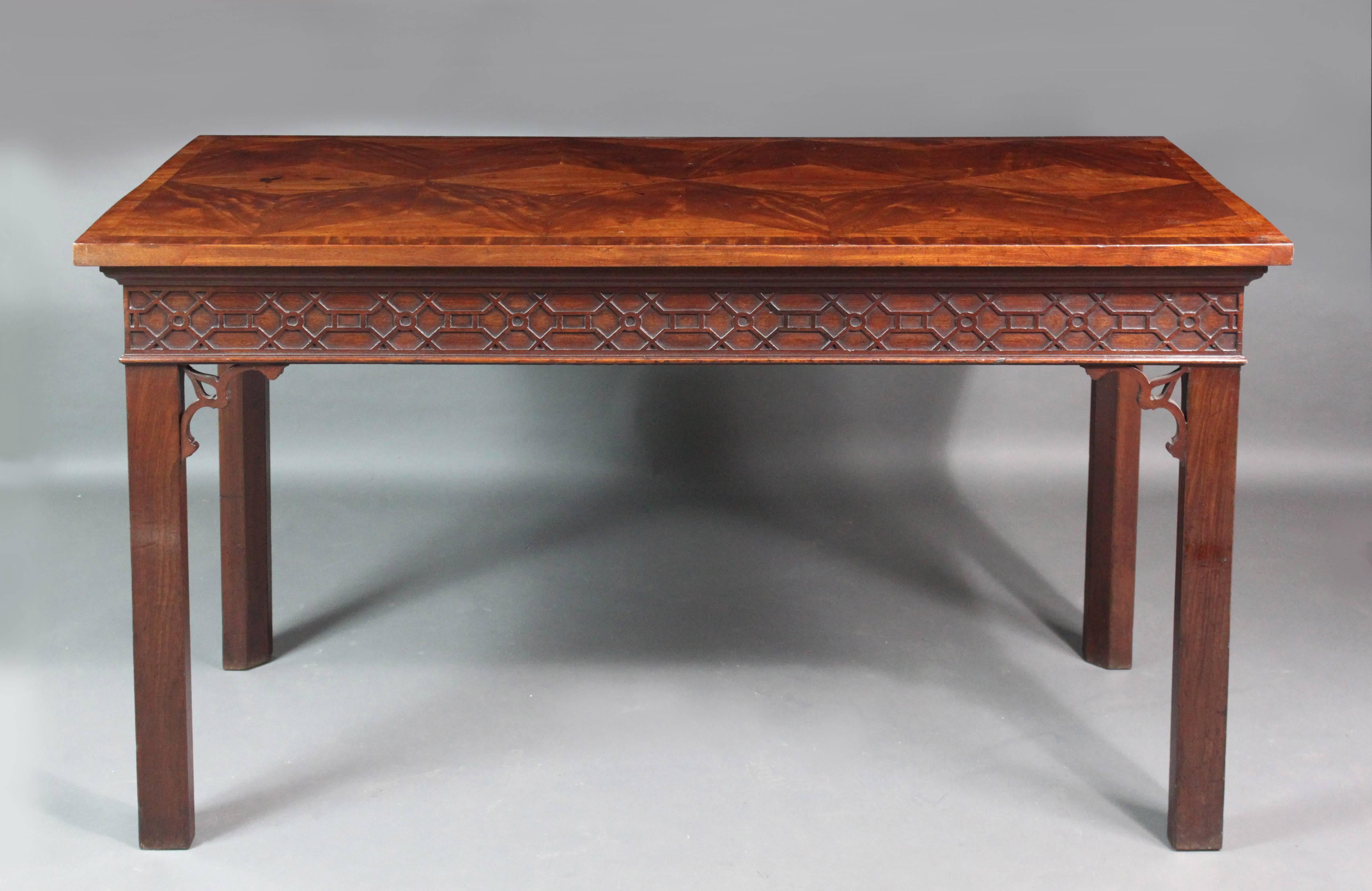 A fine George III Chippendale period mahogany side table with superb parquetry top, the frieze carved with blind fret, good original color and condition.