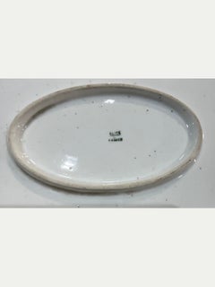Large oval Limoges porcelain presentation platter, bearing the “ELITE / L / FRAN