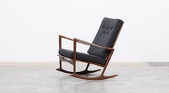 Rocking Chair aus braunem Nussbaumholz mit Gestell und Sitzpolsterung von Ib Kofod-Larsen, 1960er Jahre