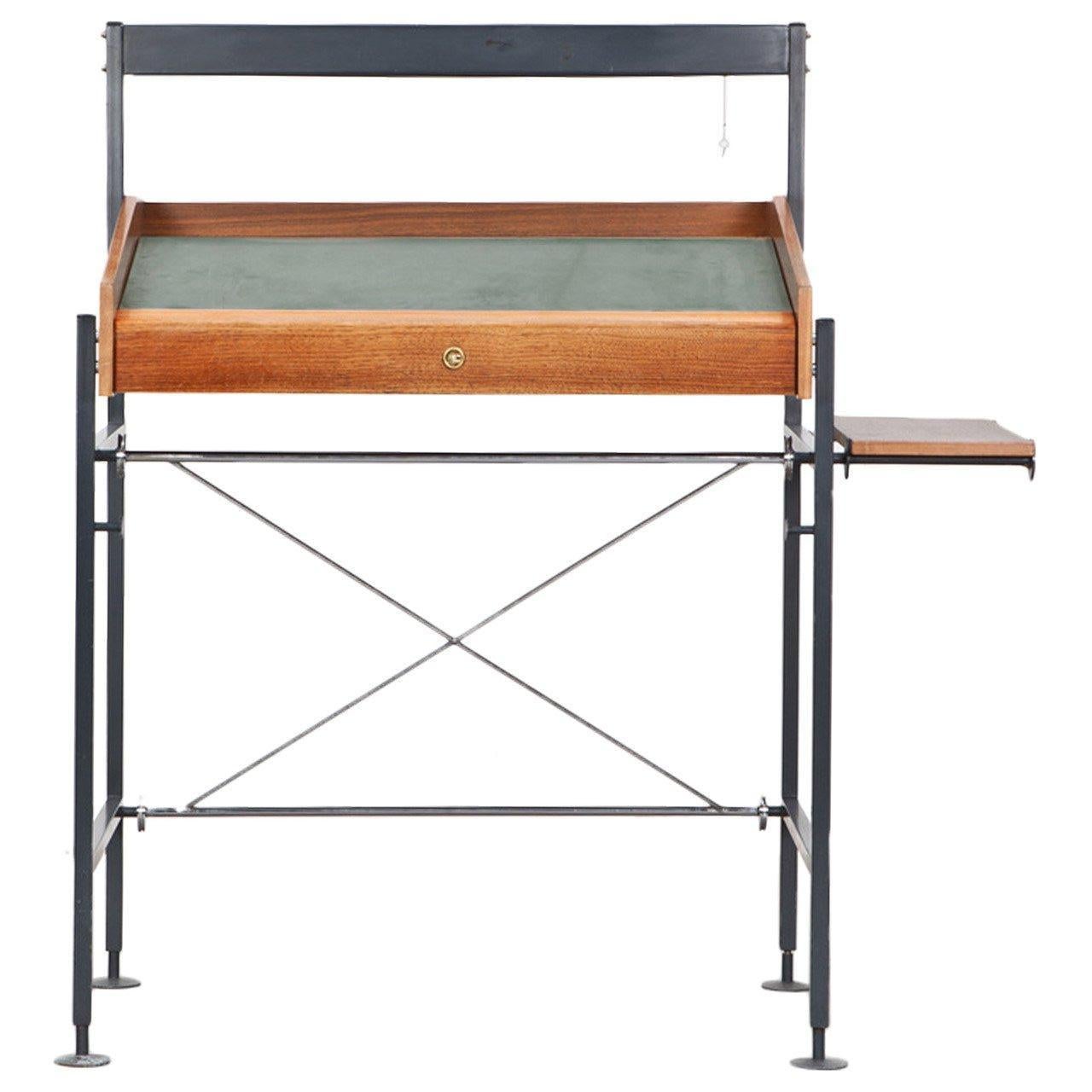 Rare Egon Eiermann stand-up desk made out of walnut, chromium-plated metal and lacquered metal. Under the writing surface is a storage space which is lockable with a key. In the upper metal frame light is installed and also a shelf on the side.