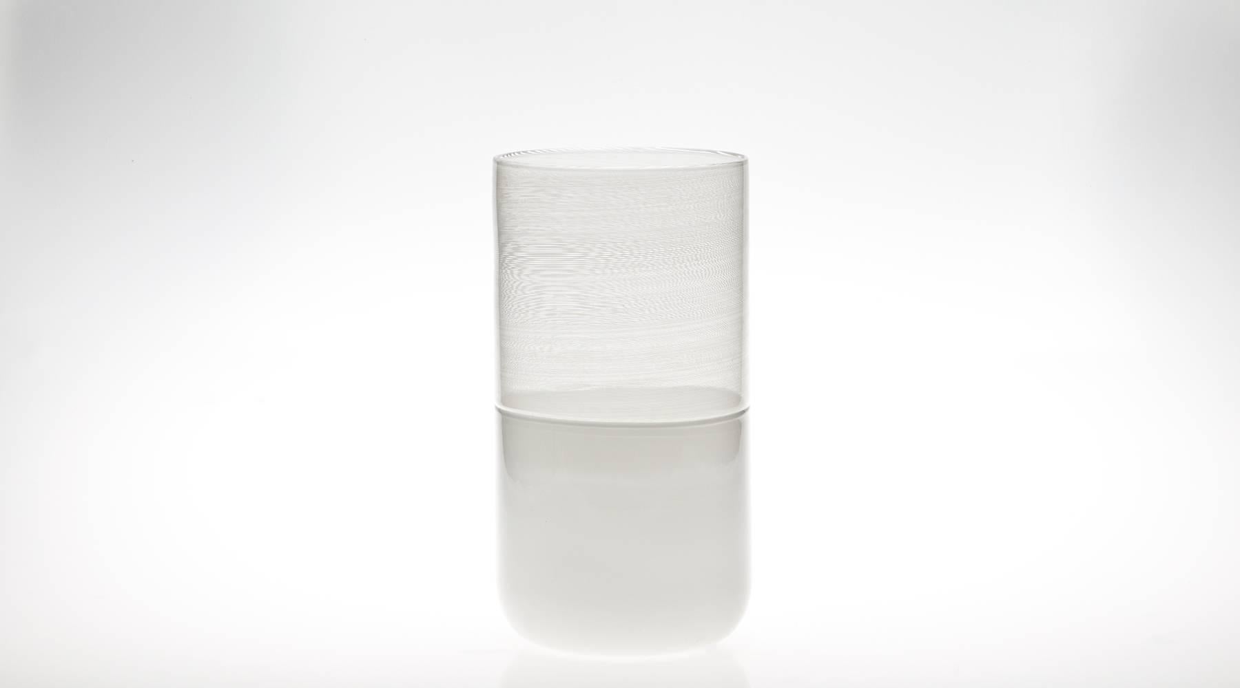 Airy, beautiful handmade vase in white and clear Murano glass by Tapio Wirkkala. It is one of the great pieces of the famous Scandinavian designer. Manufactured by Venini. 

Wirkkala was a Finnish designer and sculptor and a leading figure of