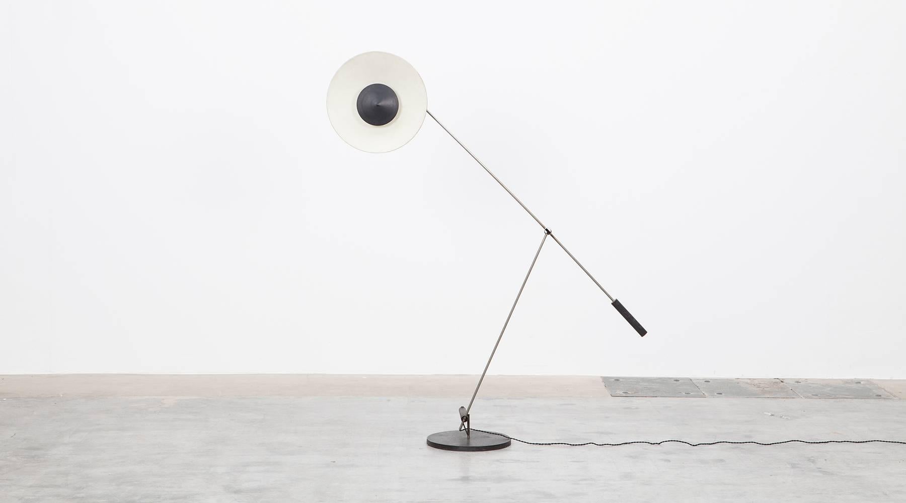 Articulated floor lamp designed by Rosmarie Lamp and Rico Baltensweiler equipped with a counter weight system. The lamp can be posed in various positions and comes in lacquered aluminum. This model is the early example from 1950. Manufactured by