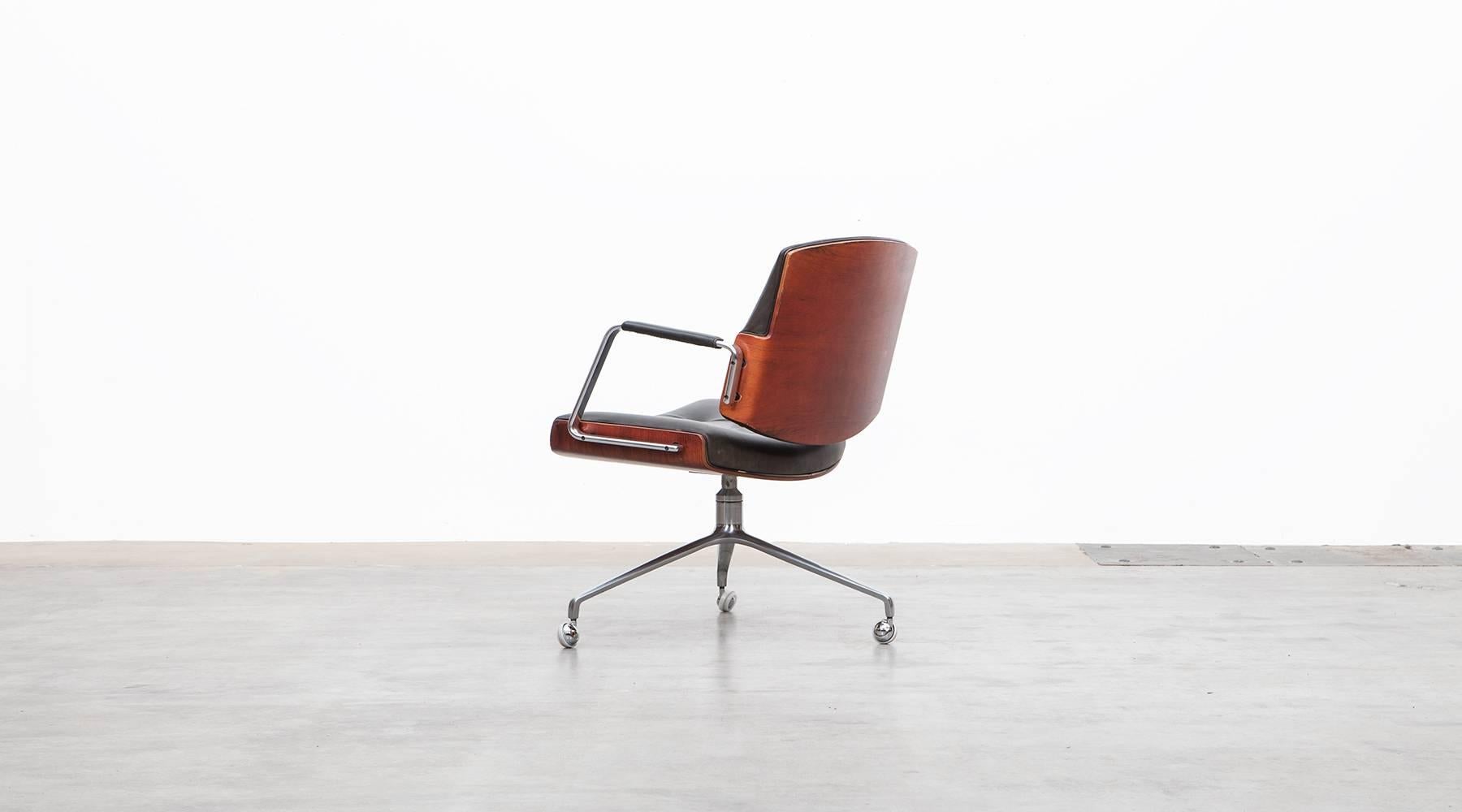 German 1960's brown wood and black leather Swivel Chair by Fabricius and Kastholm 'c'