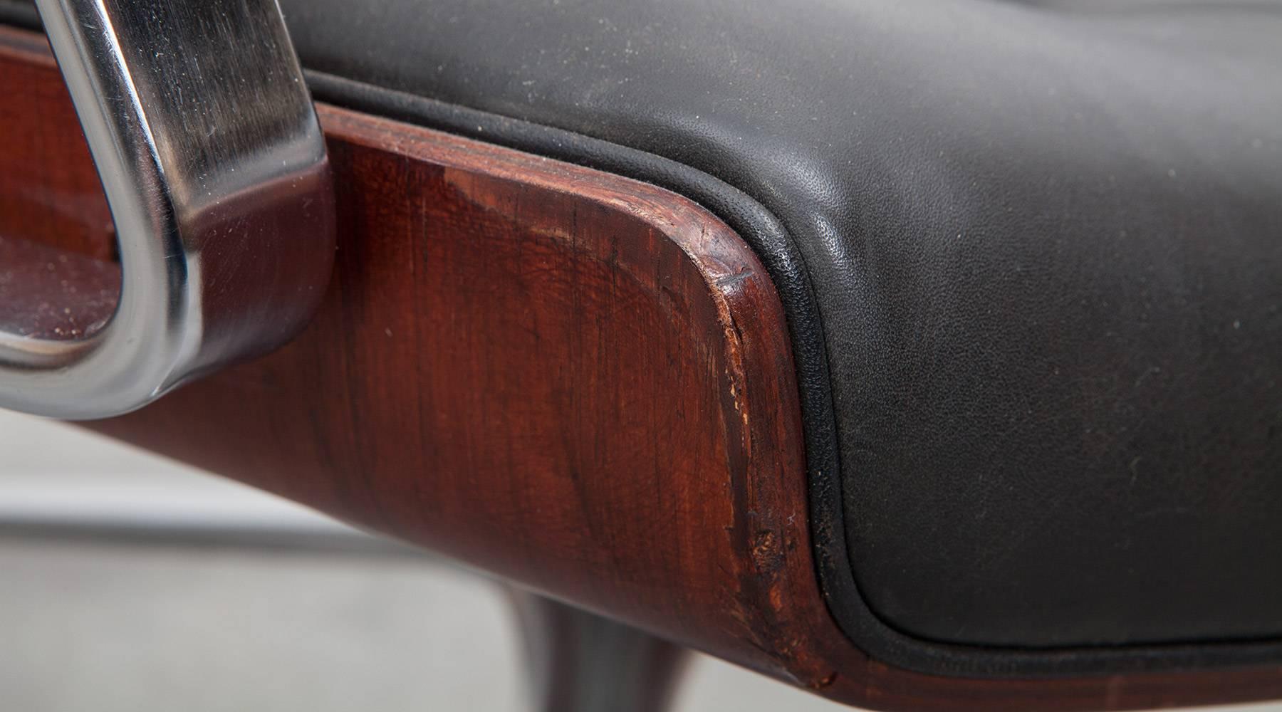 Mid-20th Century 1960's brown wood and black leather Swivel Chair by Fabricius and Kastholm 'c'