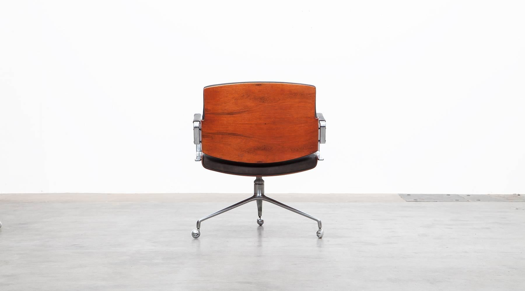 German 1960's brown wood and black leather Swivel Chair by Fabricius and Kastholm 'f'