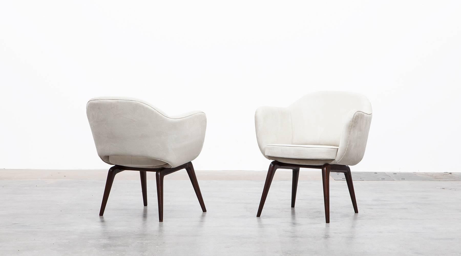 Set of Lounge Chairs, new upholstery, Jorge Zalszupin, Brazil 1967

Lounge chairs designed by famous Brazilian architect Jorge Zalszupin covered with velour leather on a wooden base. His furniture are extremely sensual and at the same time modern