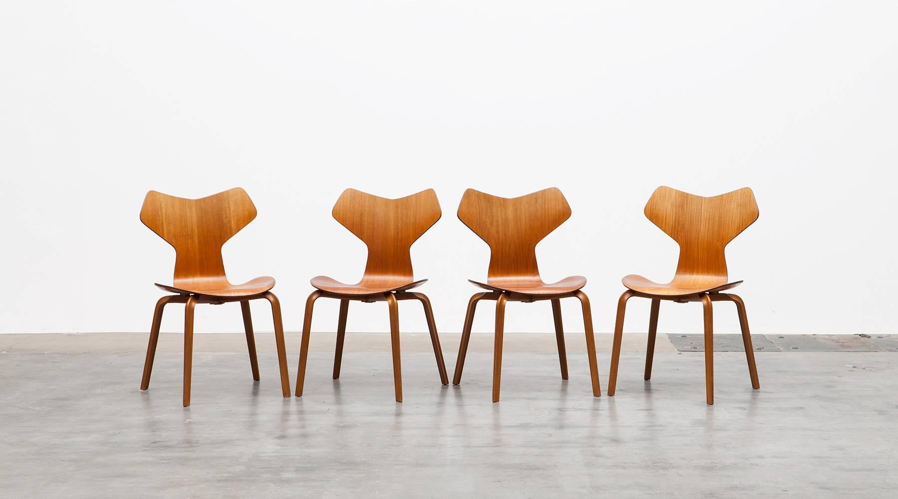 These Grand Prix chairs are a stackable set and designed by the Danish architect and designer Arne Jacobsen in 1955. Firstly presented at the spring exhibition of the Danish arts and crafts in the Kunstindustrimuseet in Copenhagen. This set of six