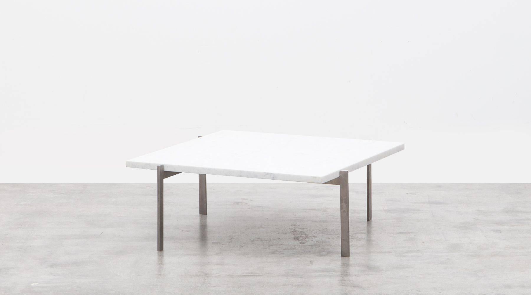 Nice large square coffee table designed by Danish Poul Kjaerholm in 1956. This table has a brushed matte chrome-plated steel frame and comes with a very nice white marble top that is in good condition with minimal wear due to use and age. Very nice