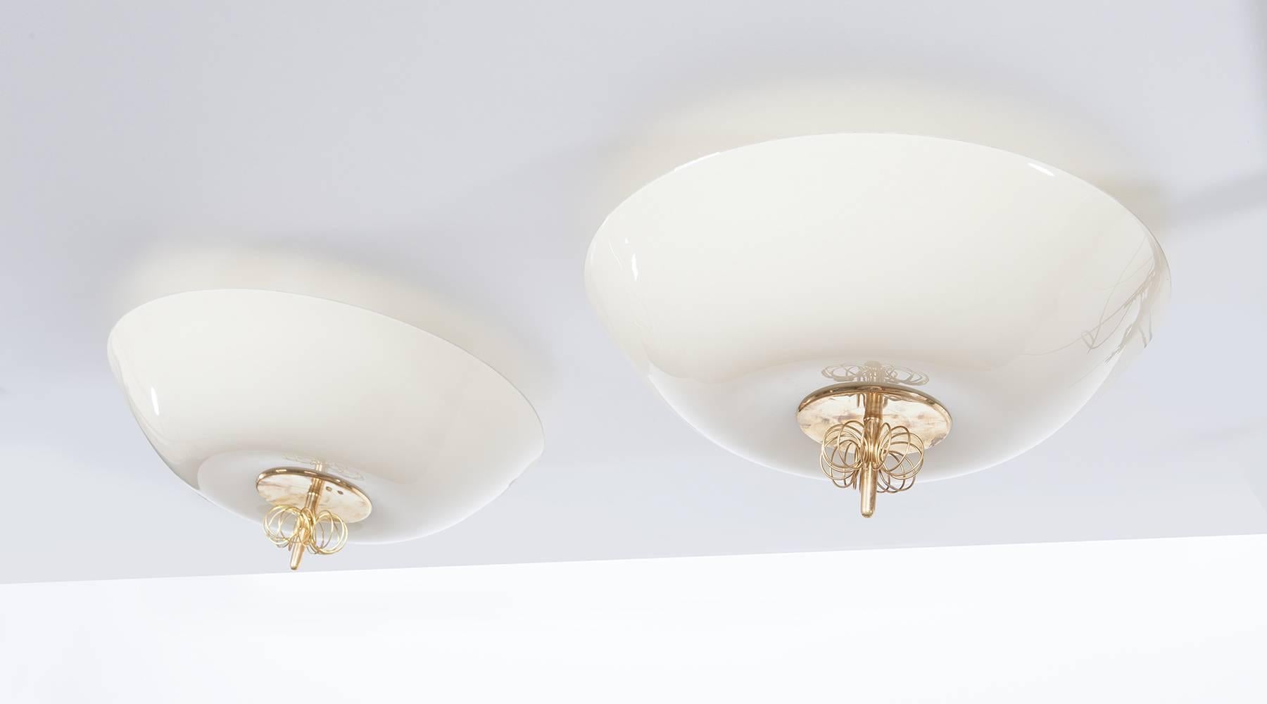 Polished Pair of Paavo Tynell Ceiling Lamps