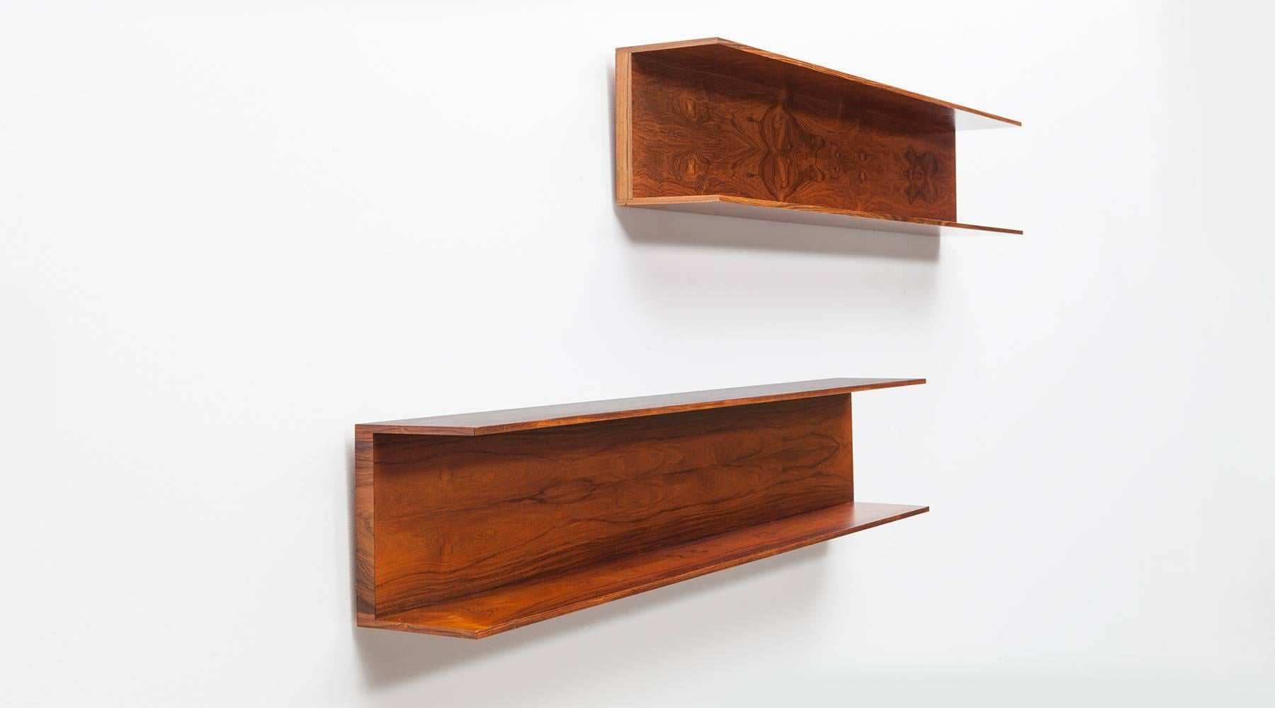 Set of two wall shelves designed by Walter Wirtz in wood. U-shaped structure in minimalistic German design from the early 1960s. The shelves are reworked and comes in very good condition. Manufactured by Wilhelm Renz.