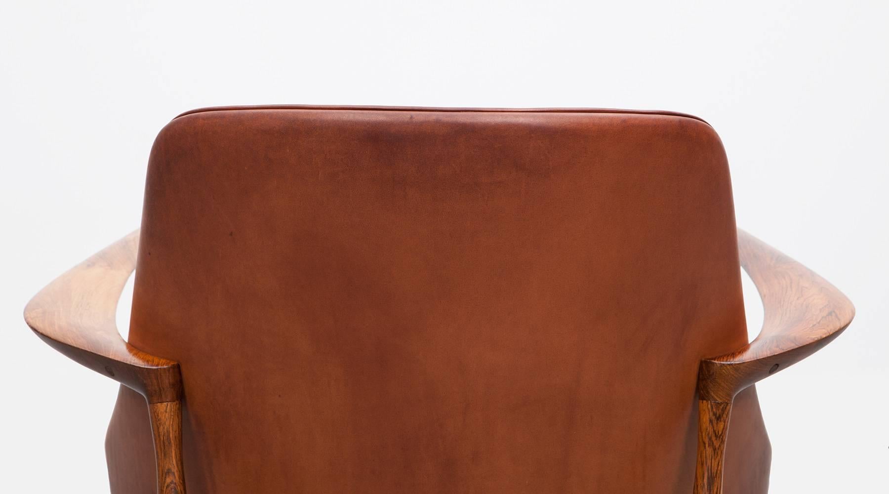 Danish 1950´s brown wooden and leather pair of Lounge Chairs by Ib Kofod-Larsen