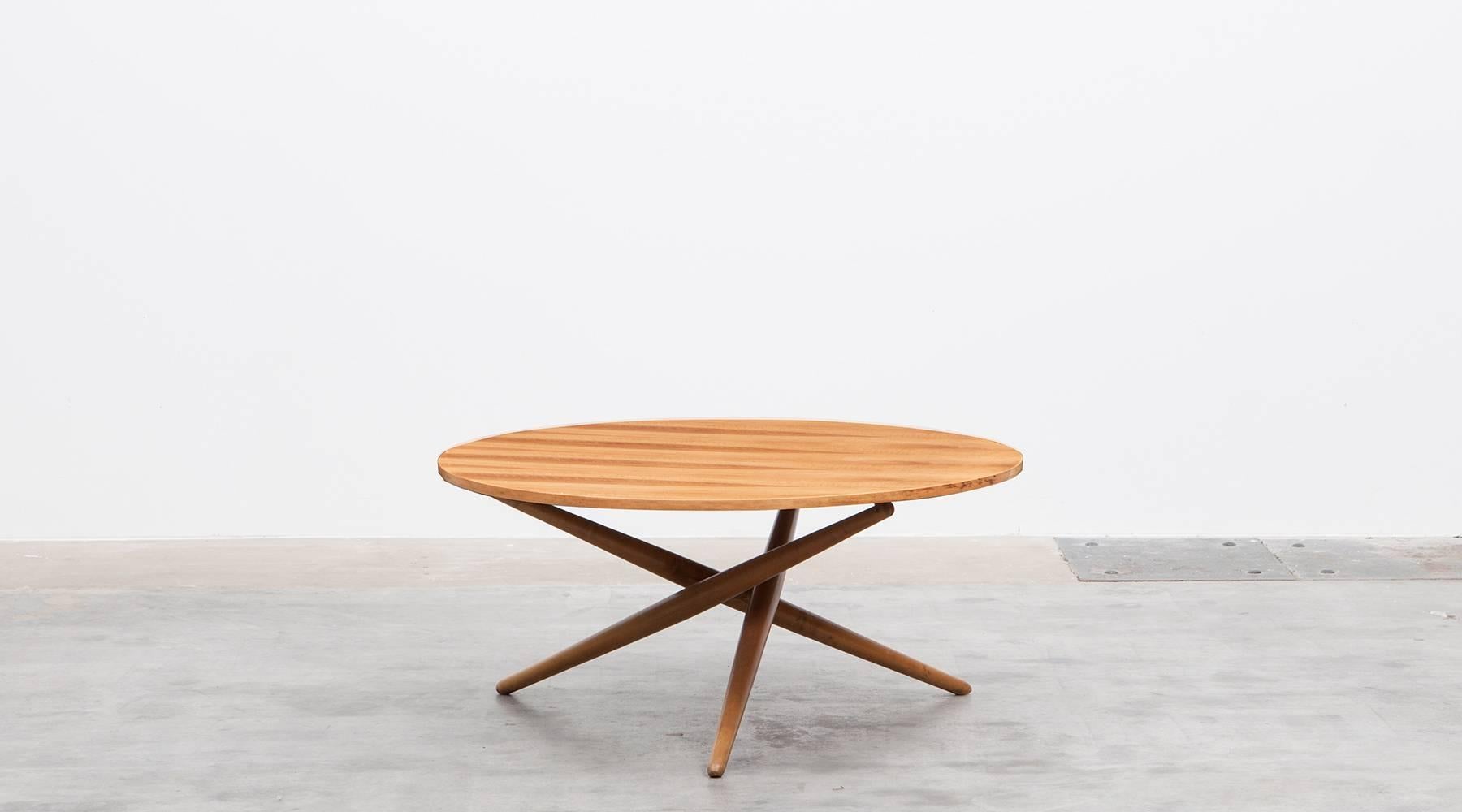 Eat and Tea Table with tabletop in teak by Jürg Bally, Switzerland, 1951.

Eat and tea table designed by Jürg Bally comes with a tabletop in teak on three wooden legs. This model strongly reminds of a Side Table by US designer T.H. Robsjohn-Gibbings