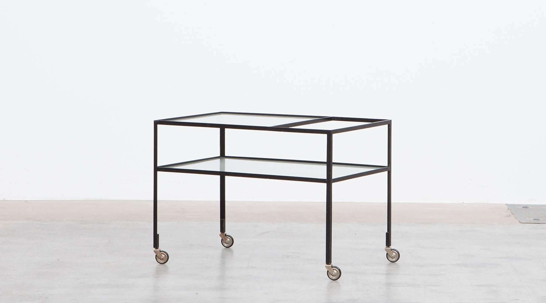 The Serving Cart in steel with original reeded glass plates is designed by German architect Herbert Hirche. The slender and reduced steel frame holds the very well-preserved original glass plate. Manufactured by Christian Holzäpfel KG. 

Bauhaus
