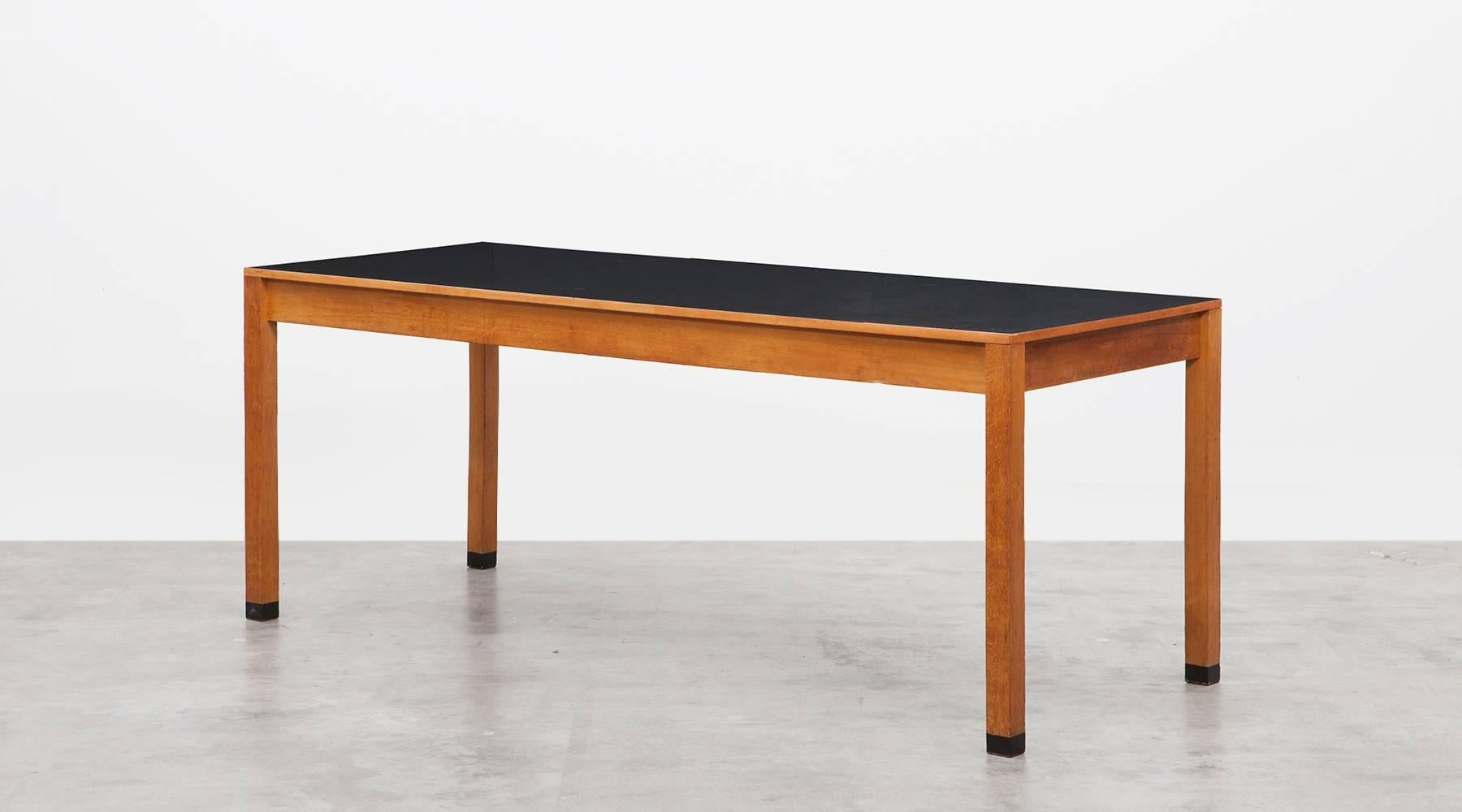 ​Purposeful Ferdinand Kramer table made of wood and linoleum top. This example comes in a comfortable size and pleasant width. We have more tables in this style in stock, with differences in length. All examples are from the 1960s. 

Ferdinand