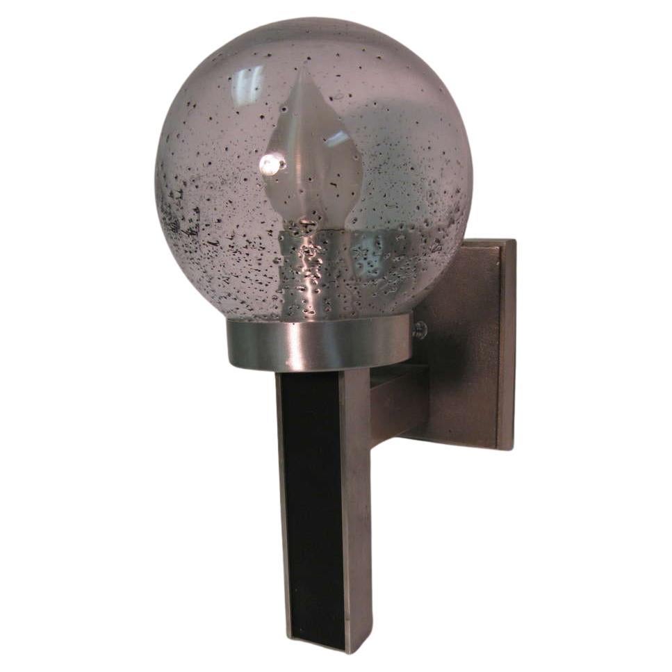 Fabulous handblown art glass globes which sit on stainless and brushed aluminum fixtures. Brushed aluminum back plates are 4.5 x 4.5. In excellent vintage condition with minimal wear.