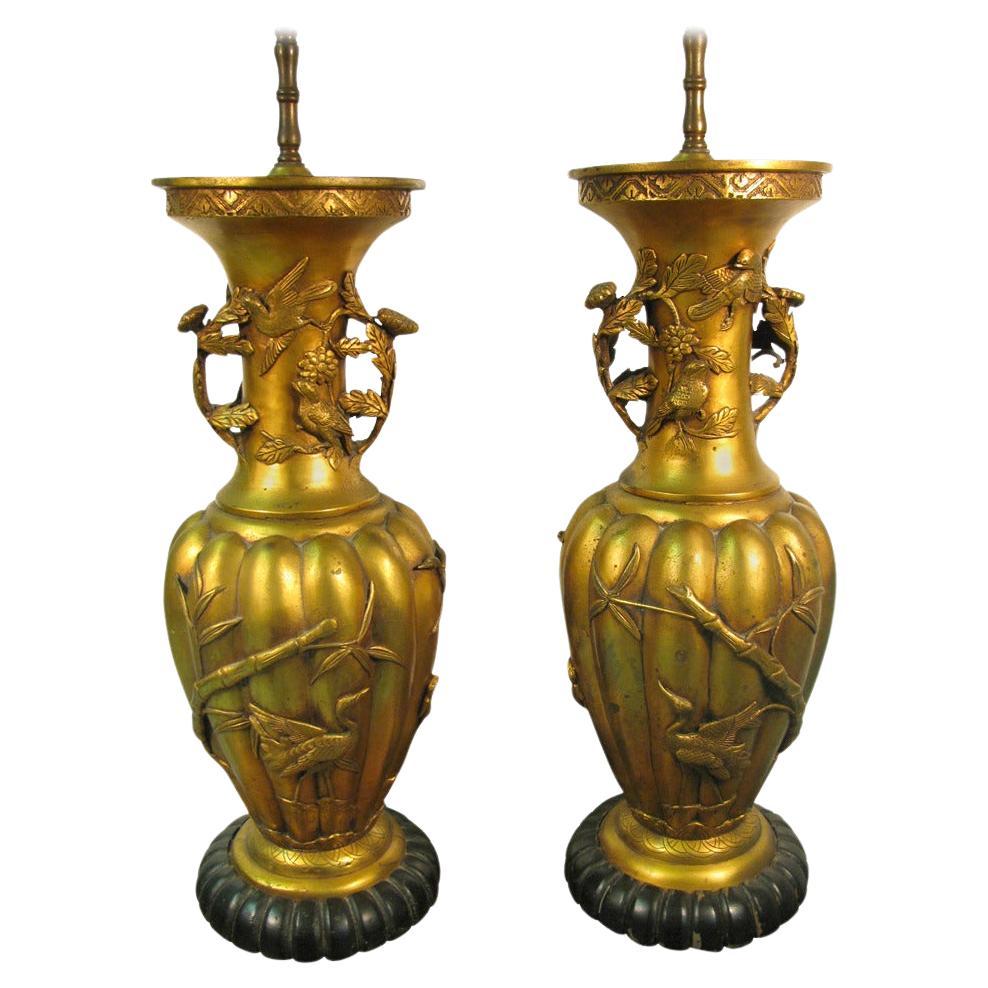 Pair of Chinese Art Deco Book Matched Hand Chased Gilt Metal Table Lamps For Sale