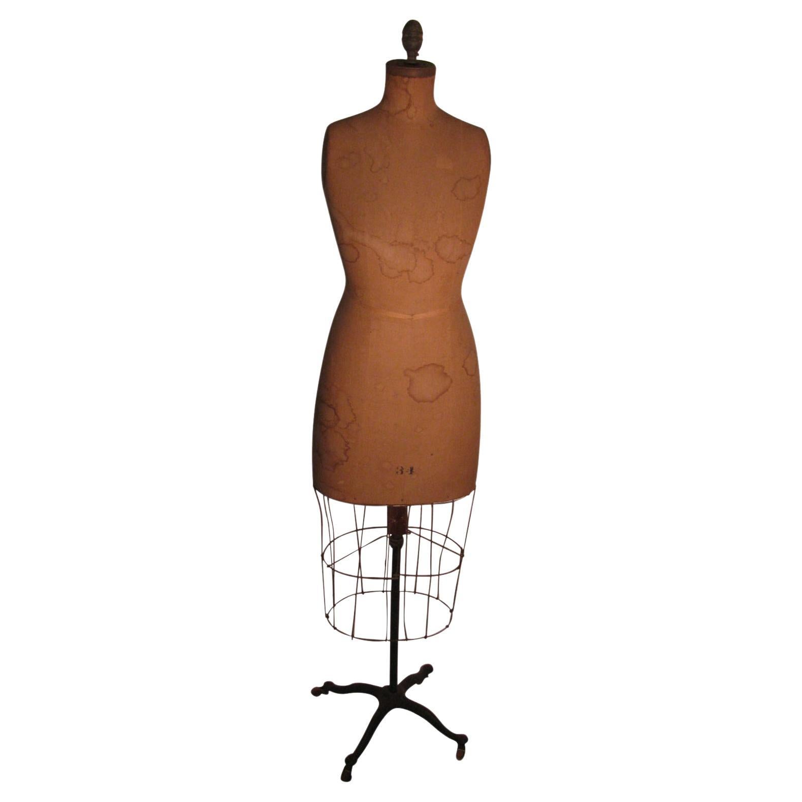 Maniquí con forma de vestido de finales del siglo XIX
